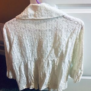 Ecru lace summer jacket.